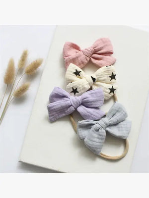 Annie & Charles® Baby Haarband Set mit Musselin Schleife